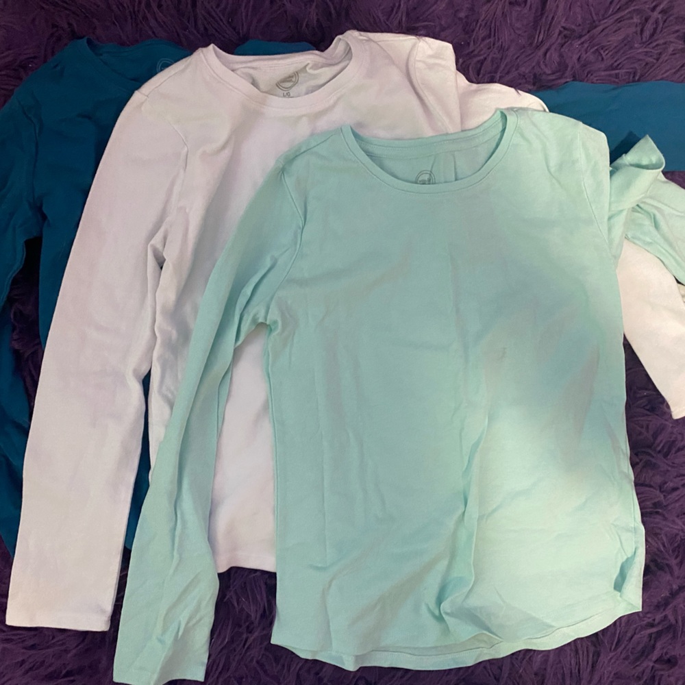 Three long shelve super comfy shirts. Never worn, too small. Sold as a set.